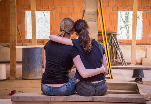Mother and daughter looking at their home renovation project